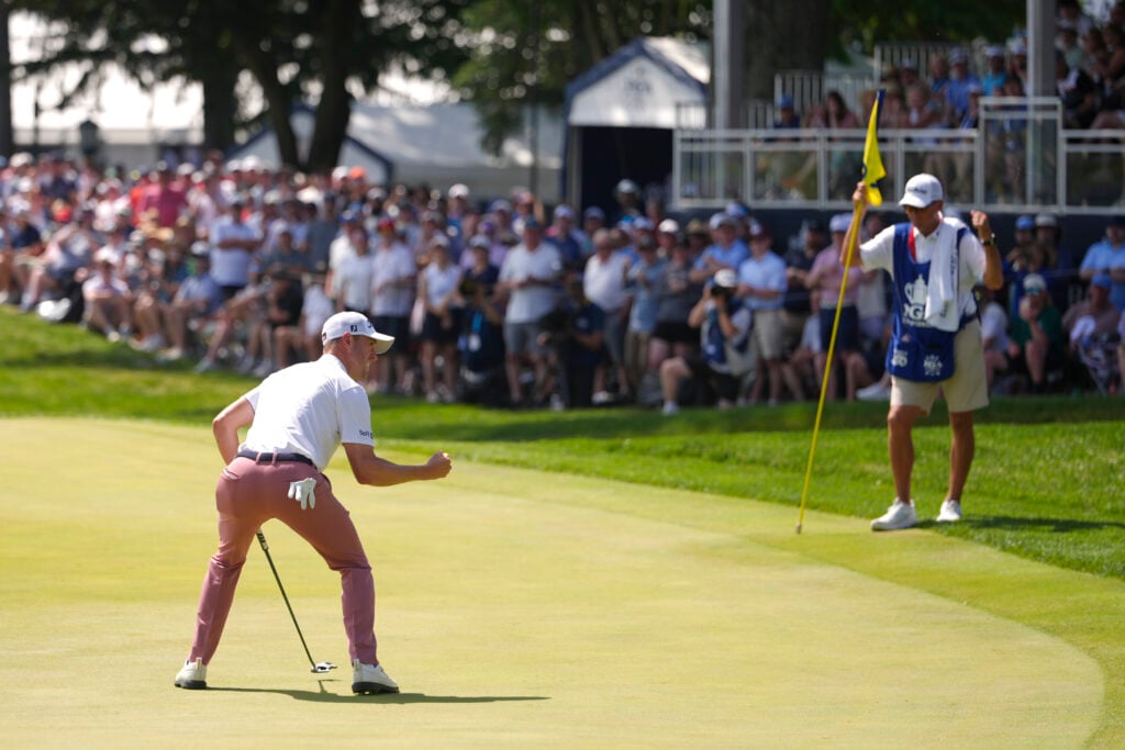 Justin Thomas celebrates a par on his final hole at the PGA Championship
