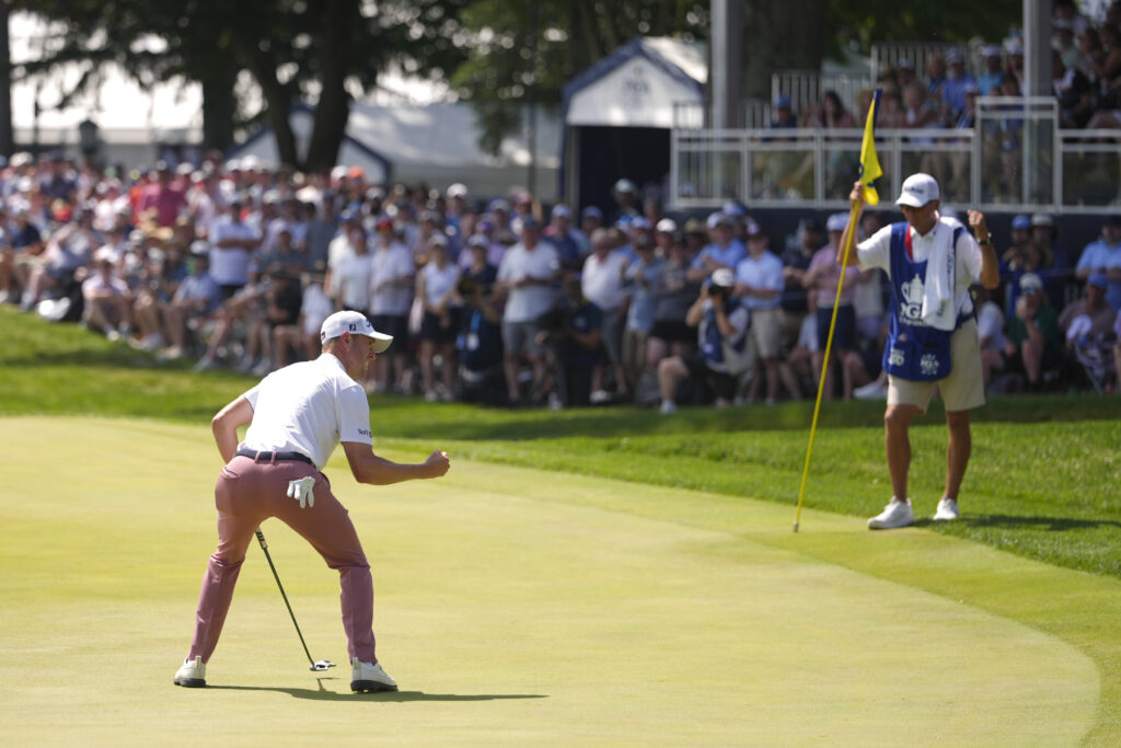 Justin Thomas reacts after making his putt to save par on the 18th hole during the final round of the PGA Championship at Aronimink