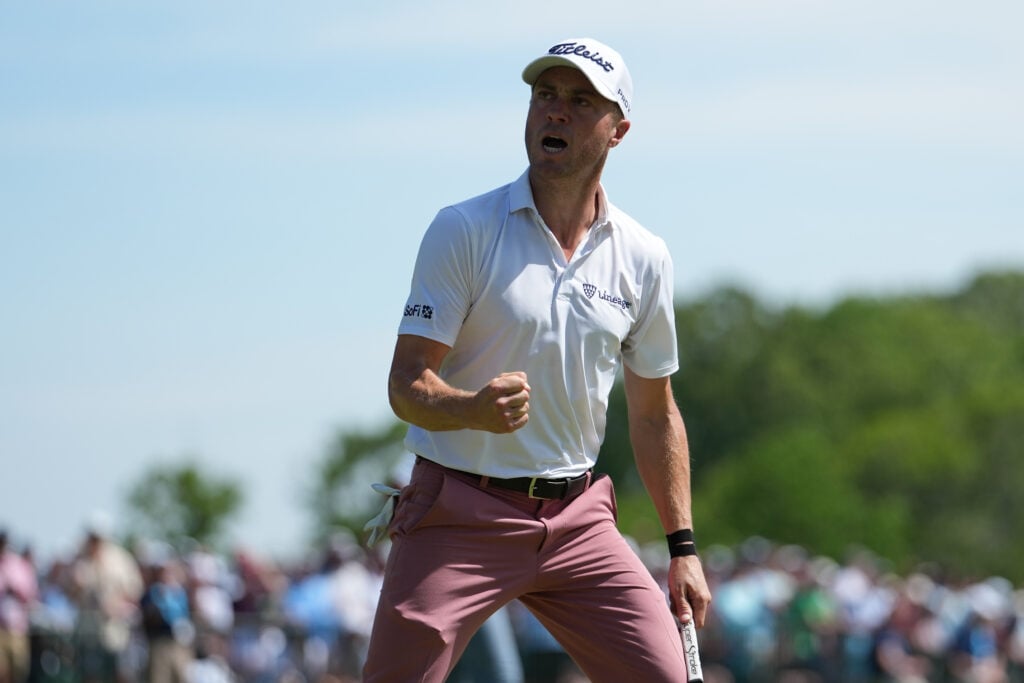Justin Thomas reacts to his putt on the 18th green during the final round of PGA Championship at Aronimink Golf Club