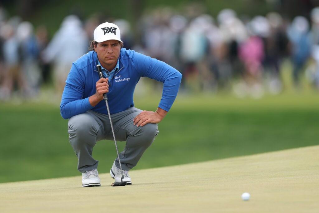 Aldrich Potgieter of South Africa lines up a putt on the ninth green during the first round of the PGA Championship at Aronimink Golf Club