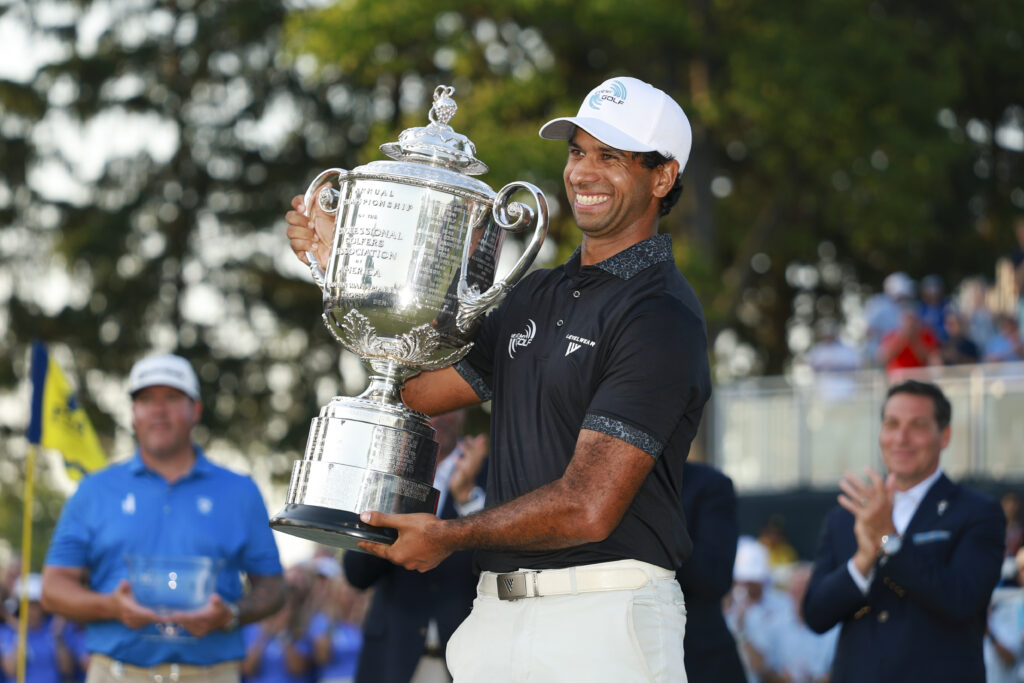 Aaron Rai raises the Wanamaker Trophy after winning the PGA Championship at Aronimink Golf Club