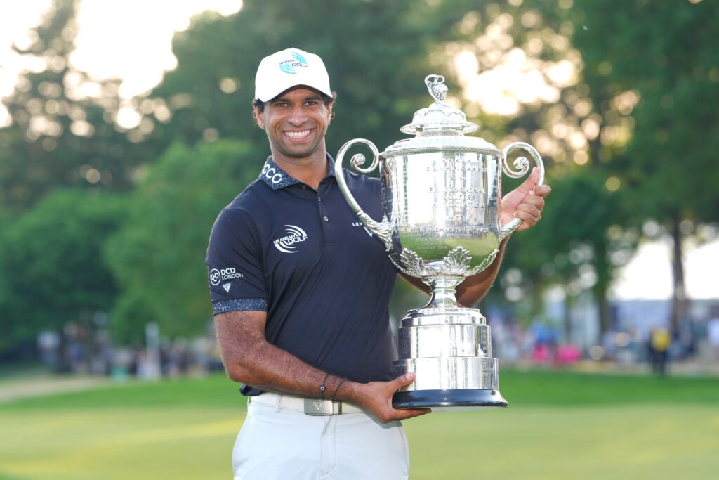 Aaron Rai poses with the Wanamaker Trophy after winning the PGA Championship at Aronimink Golf Club