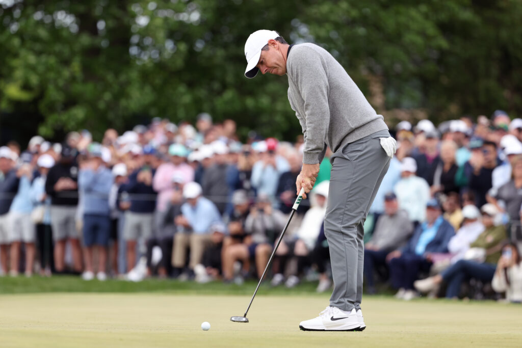 Rory McIlroy of Northern Ireland putts on the fourth green during the second round of the PGA Championship at Aronimink Golf Club