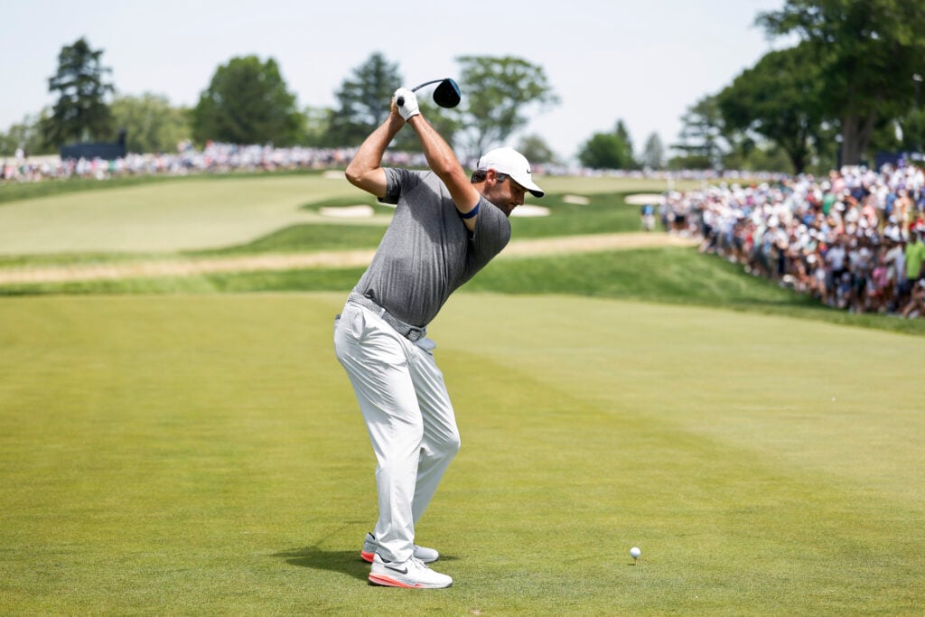 Scottie Scheffler hits a tee shot during the final round of the PGA Championship