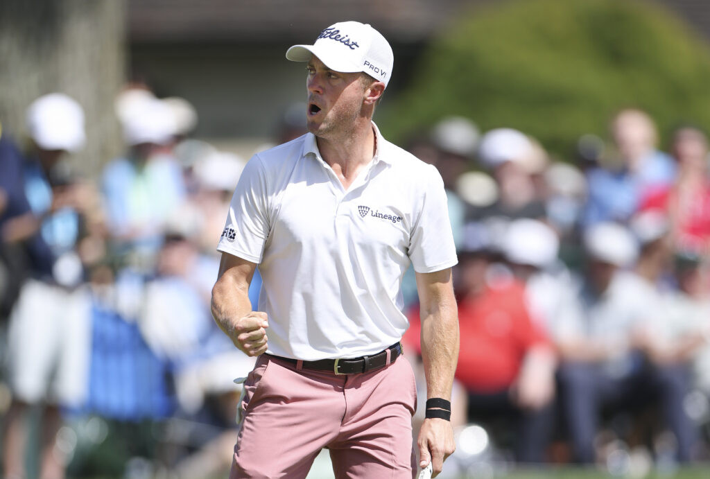 Justin Thomas celebrates his putt on the last hole during the final round of the PGA Championship