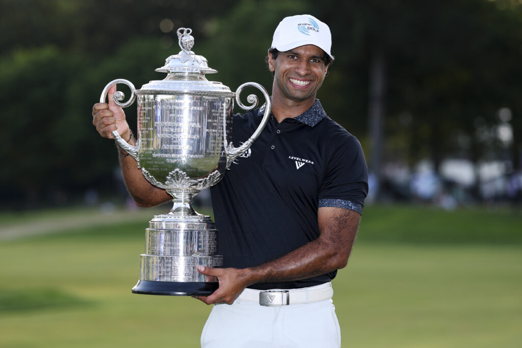 Aaron Rai of England celebrates with The Wanamaker Trophy after winning the 2026 PGA Championship at Aronimink Golf Club