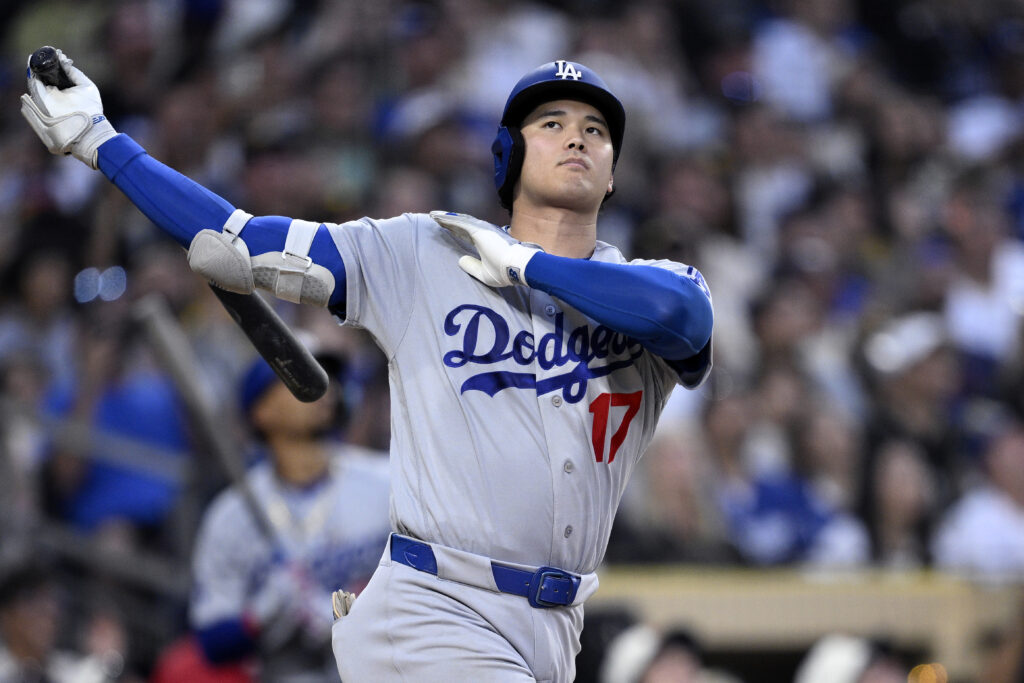 Shohei Ohtani #17 of the Los Angeles Dodgers bats during the sixth inning against the San Diego Padres at Petco Park.