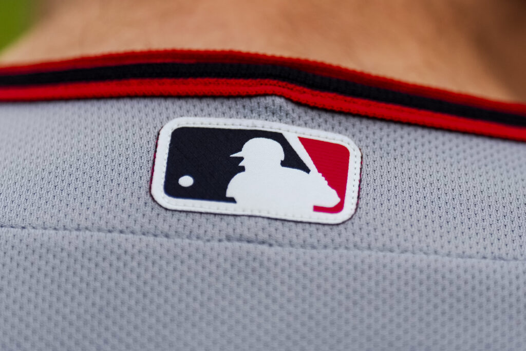 A detail of the MLB logo on a Cleveland Guardians uniform during the game against the Detroit Tigers at Comerica Park.