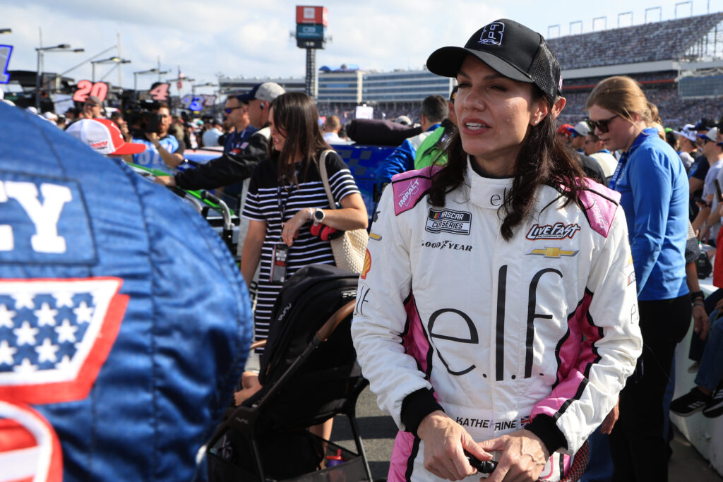 Katherine Legge (#78 Live Fast Motorsports e.l.f. Cosmetics Chevrolet) walks down pit road prior to the running of the NASCAR Cup Series Coca-Cola 600 on May 24, 2026 at Charlotte Motor Speedway in Charlotte, NC.