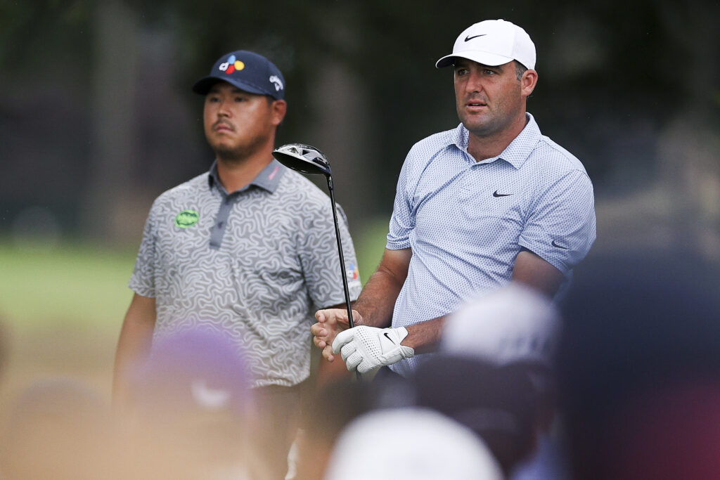 Scottie Scheffler and Si Woo Kim in action during the first round of THE CJ CUP Byron Nelson at TPC Craig Ranch