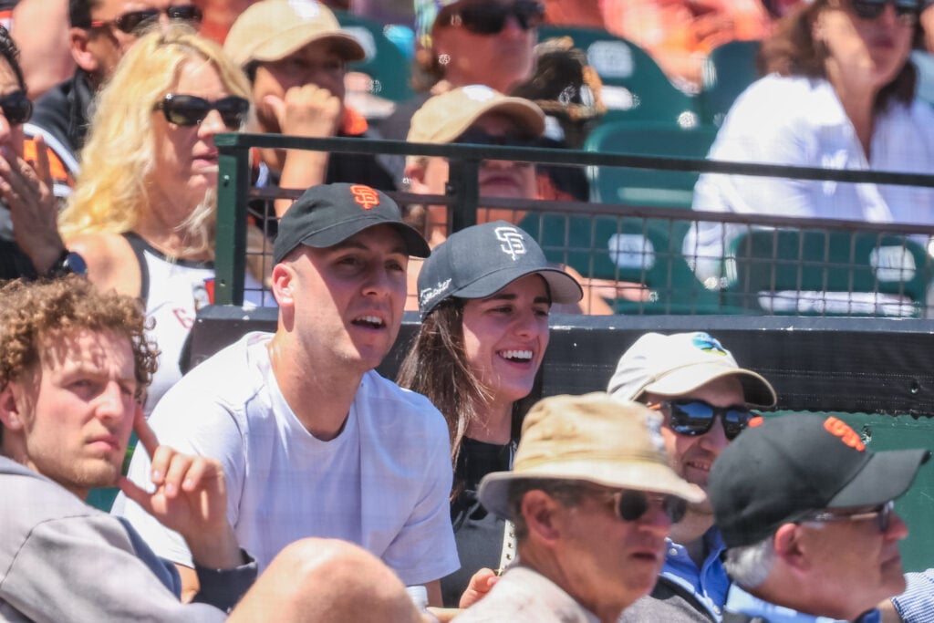 WNBA player Caitlin Clark looks on smiling during a MLB game between the Arizona Diamondbacks and the San Francisco Giants on May 27, 2026 at Oracle Park.