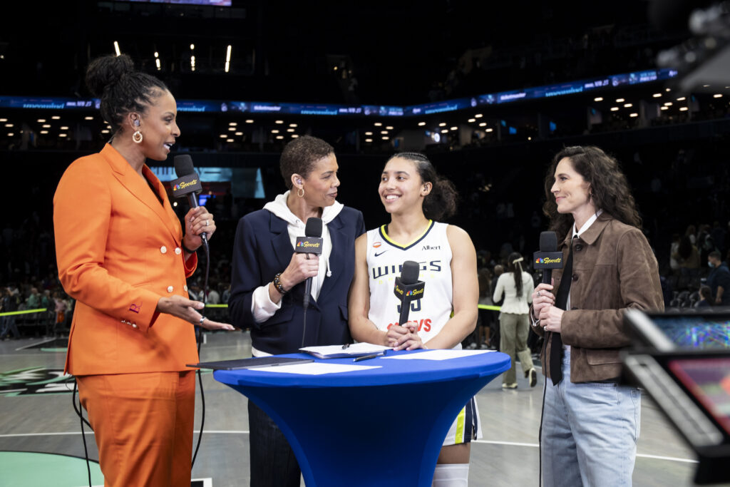 Azzi Fudd #35 of the Dallas Wings is interviewed after the game by Cheryl Miller, LaChina Robinson and Sue Bird after their win over the New York Liberty at Barclays Center.