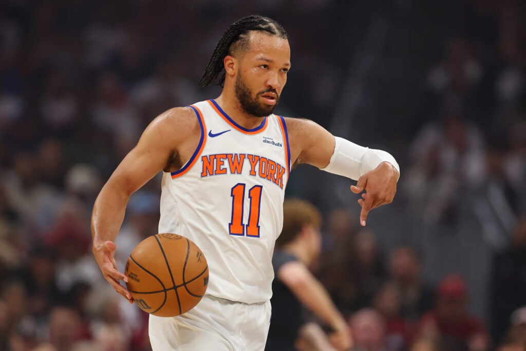 Jalen Brunson #11 of the New York Knicks handles the ball against the Cleveland Cavaliers during the first quarter in Game Four of the NBA Eastern Conference Finals at Rocket Arena.