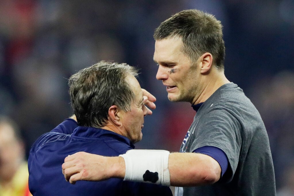 Head coach Bill Belichick of the New England Patriots and Tom Brady #12 celebrate after winning 34-28 over the Atlanta Falcons in Super Bowl 51 at NRG Stadium.