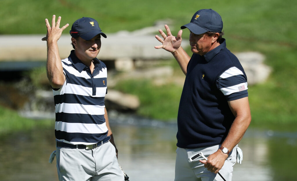Kevin Kisner and Phil Mickelson celebrate during the first session of the 2017 Presidents Cup