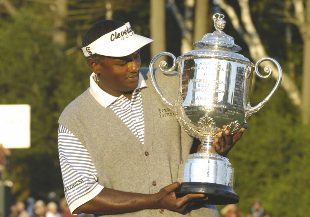 Vijay Singh lifts the trophy after winning the 2004 PGA Championship