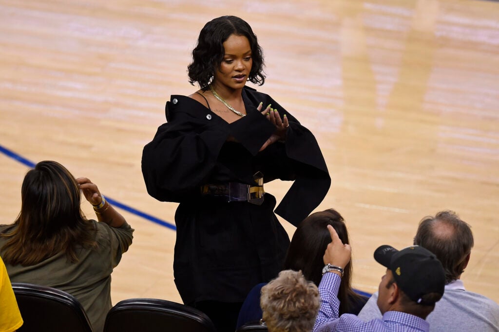 Rihanna gestures while sitting court side during the fourth quarter of Game 1 of the NBA Finals at Oracle Arena in Oakland, Calif., on Thursday, June 1, 2017. The Golden State Warriors defeated the Cleveland Cavaliers 113-91. (Jose Carlos Fajardo/Bay Area