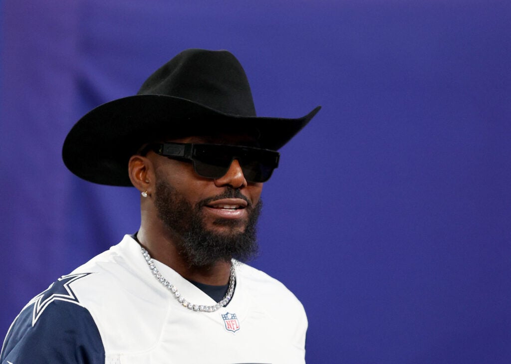 Former Dallas Cowboys wide receiver Dez Bryant walks on the field before the game between the New York Giants and the Dallas Cowboys at MetLife Stadium.