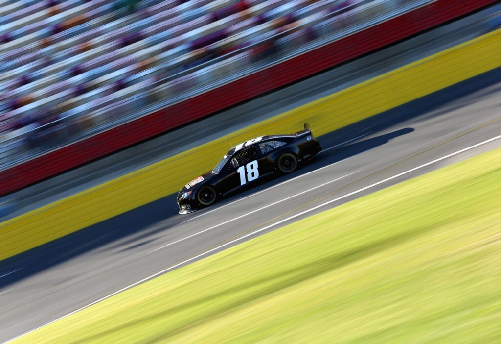 Kyle Busch, driver of the #18 Joe Gibbs Racing Toyota, in action during NASCAR Testing at Charlotte Motor Speedway on January 18, 2013 in Charlotte, North Carolina.