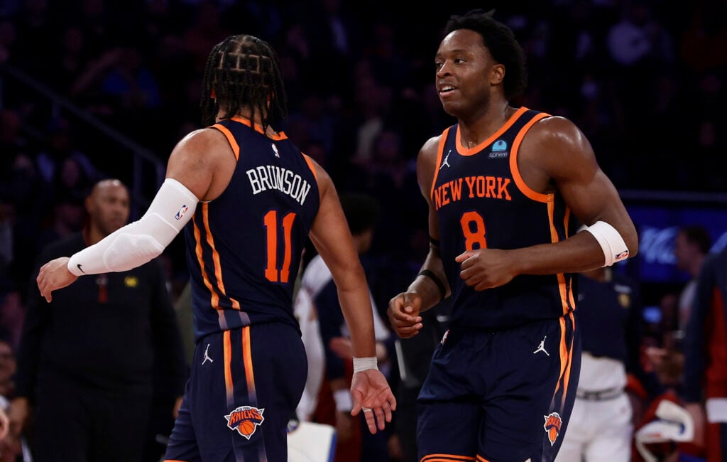 OG Anunoby #8 and Jalen Brunson #11 of the New York Knicks in action against the Denver Nuggets at Madison Square Garden.
