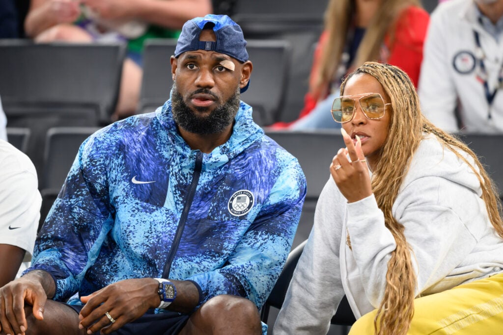 LeBron James and Savannah James attend the Women's basketball quarterfinal game between Team United States and Team Nigeria on day twelve of the Olympic Games Paris 2024 at Bercy Arena.