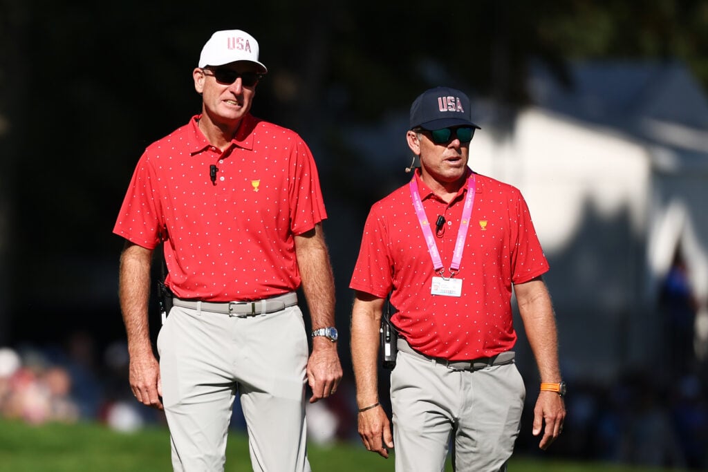 Jim Furyk and Justin Leonard look on during Sunday Singles at the 2024 Presidents Cup at The Royal Montreal Golf Club