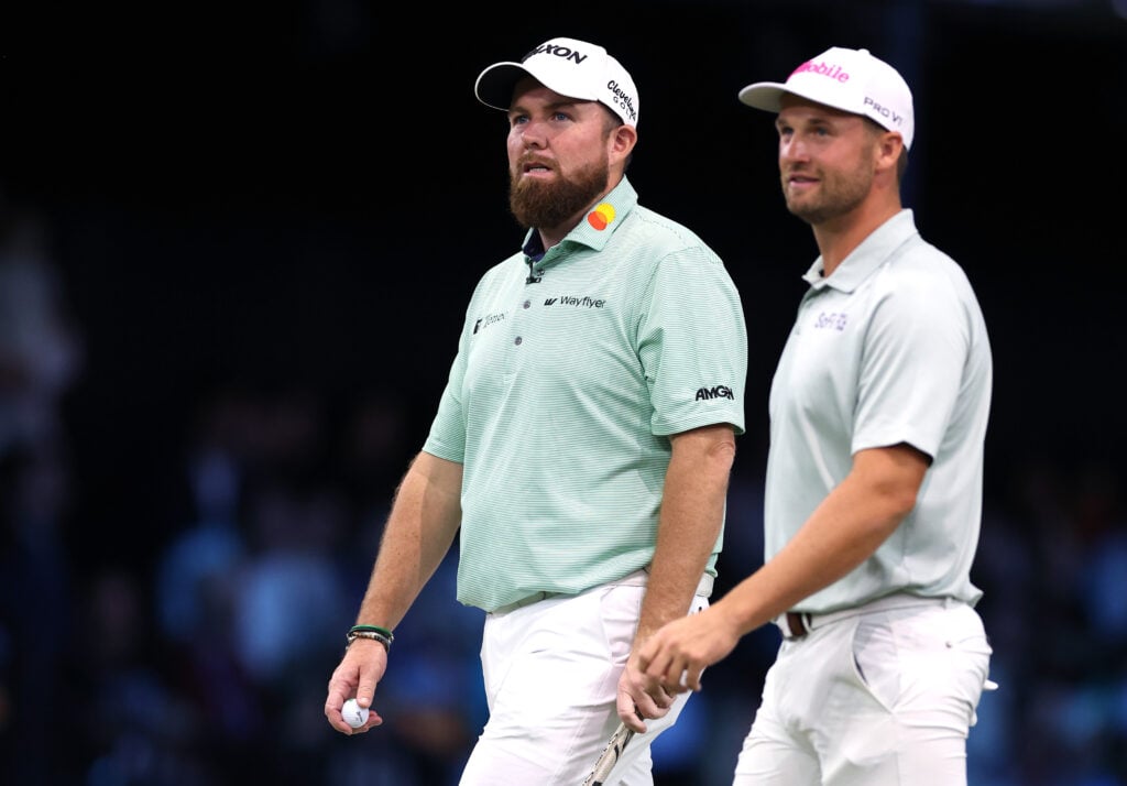 Shane Lowry and Wyndham Clark look on during their TGL match against the New York Golf Club at SoFi Center