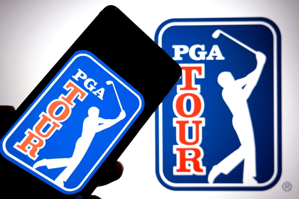 In this photo illustration, a PGA Tour logo is seen