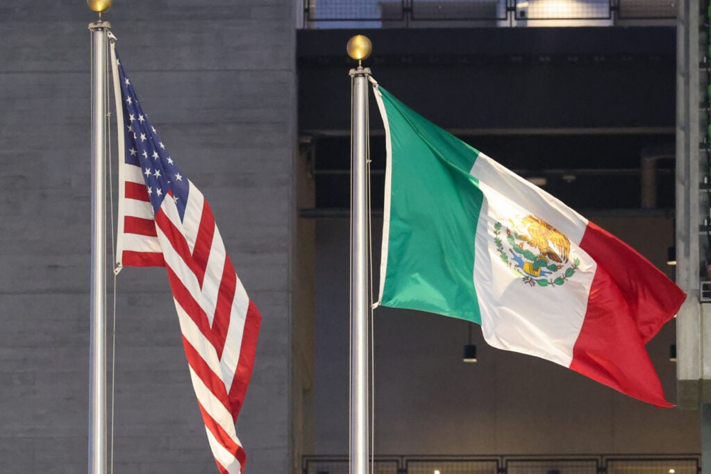 The Mexico and United States flags flow in the wind before the Leagues Cup Group stage match between Club America and Portland Timbers