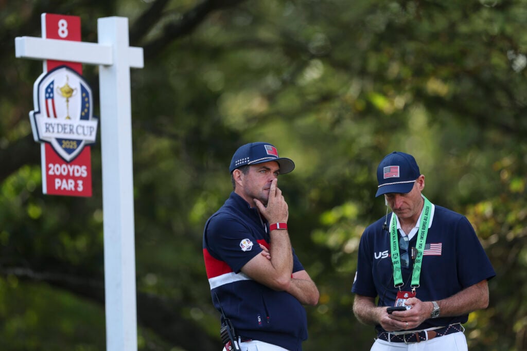 Keegan Bradley and Jim Furyk chat during the second day of the 2025 Ryder Cup
