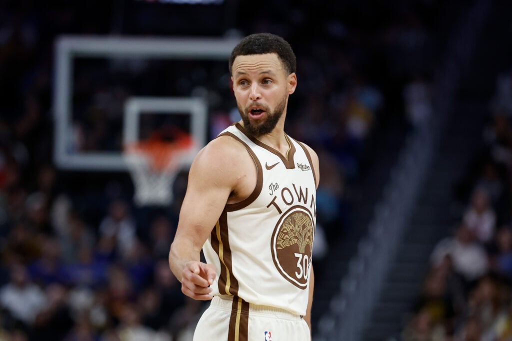 Stephen Curry #30 of the Golden State Warriors looks on in the fourth quarter against the Charlotte Hornets at Chase Center.