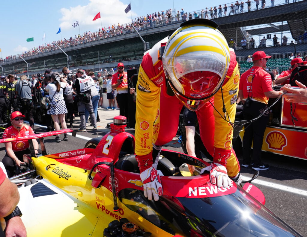 IndyCar driver Josef Newgarden climbs into his car to qualify during the second day of qualifications for the 110th Running of the Indianapolis 500 on May 17th, 2026, at the Indianapolis Motor Speedway in Indianapolis, Indiana.