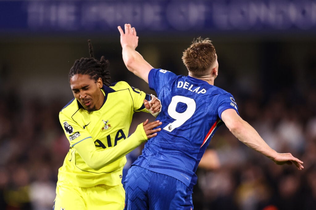 Djed Spence is elbowed by Liam Delap during a Premier League clash between Chelsea and Tottenham