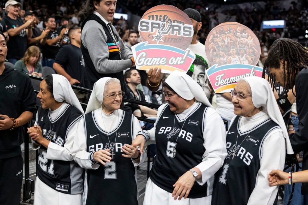 SpursOKCG4 - Fans cheer during Spurs game