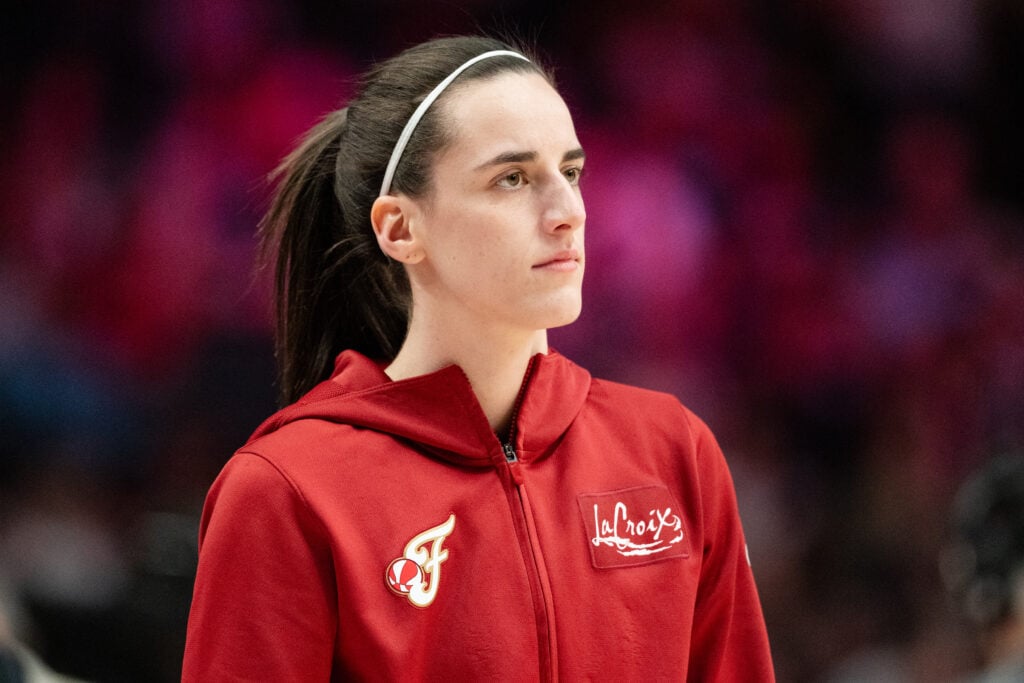Caitlin Clark #22 of the Indiana Fever warms up before the game against the Portland Fire at Moda Center.
