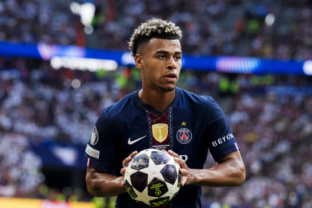 Desire Doue of Paris Saint-Germain FC holds the ball during