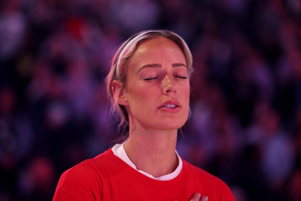 Sophie Cunningham #8 of the Indiana Fever stands for the national anthem before their game against the Golden State Valkyries at Chase Center on May 28, 2026 in San Francisco, California.