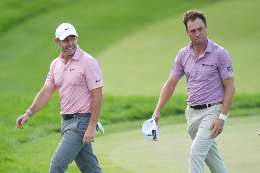 Justin Thomas and Rory McIlroy on the 18th green after the second round of the Memorial Tournament at Muirfield Village