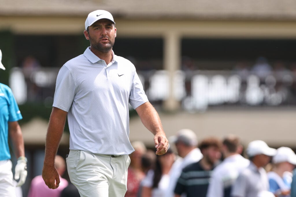 Scottie Scheffler leaves the tee during the third round of the Memorial Tournament