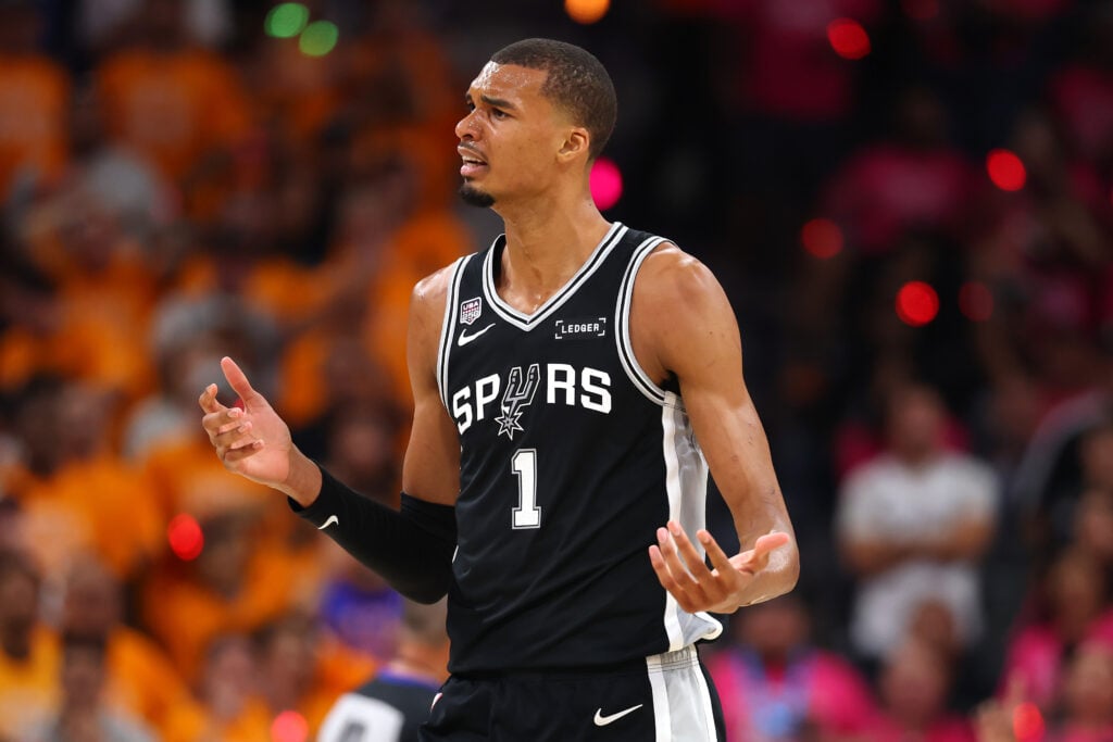Victor Wembanyama #1 of the San Antonio Spurs reacts during the second quarter against the New York Knicks in Game One of the 2026 NBA Finals at Frost Bank Center.