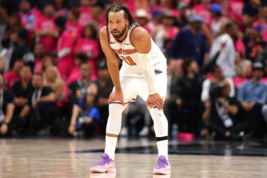 Jalen Brunson #11 of the New York Knicks looks on during the fourth quarter against the San Antonio Spurs in Game One of the 2026 NBA Finals at Frost Bank Center.
