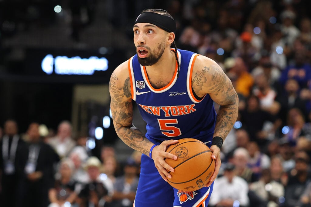 Jose Alvarado #5 of the New York Knicks looks to pass the ball during the third quarter against the San Antonio Spurs in Game Two of the 2026 NBA Finals at Frost Bank Center.