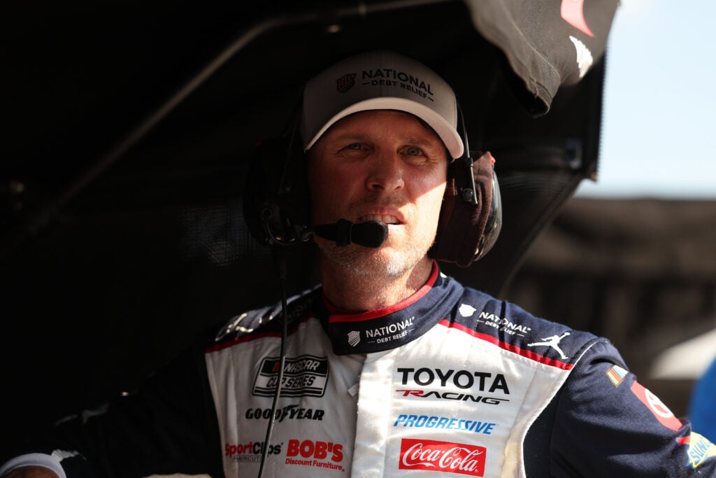 Denny Hamlin, driver of the #11 National Debt Relief Toyota, looks on during practice for the NASCAR Cup Series FireKeepers Casino 400 at Michigan International Speedway on June 06, 2026 in Brooklyn, Michigan.