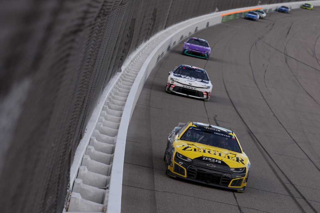 Carson Hocevar, driver of the #77 Zeigler Auto Group Chevrolet, drives during the NASCAR Cup Series FireKeepers Casino 400 at Michigan International Speedway on June 07, 2026 in Brooklyn, Michigan.