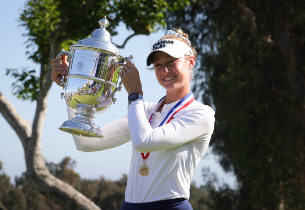 Nelly Korda poses with trophy on the 18th green after winning the U.S. Women's Open at Riviera