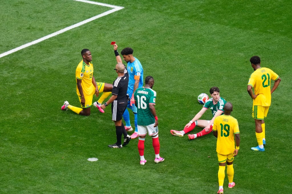 Sphephelo Sithole of South Africa see the red card during the FIFA World Cup 2026 Group A match between Mexico and South Africa.