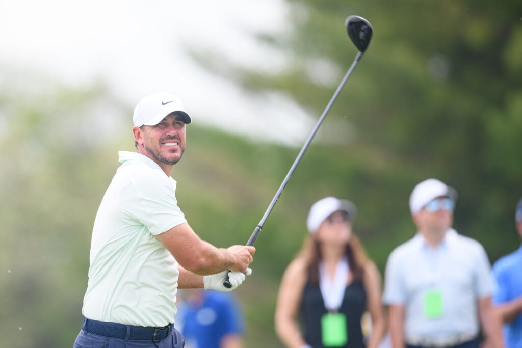 Brooks Koepka reacts to his tee shot on the second hole during the first round of the Canadian Open at TPC Toronto
