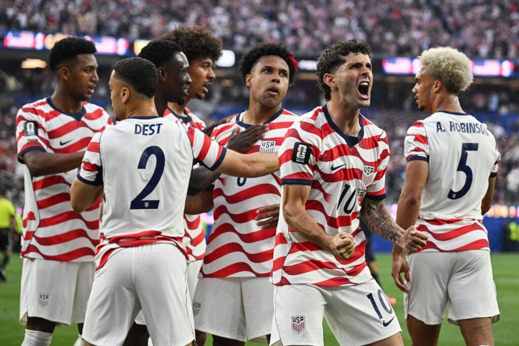 Christian Pulisic of United States celebrates his side's first goal, an own goal by Damian Bobadilla #16 of Paraguay (not pictured), during the FIFA World Cup 2026 Group D match between USA and Paraguay at Los Angeles Stadium on June 12, 2026 in Inglewood, California.