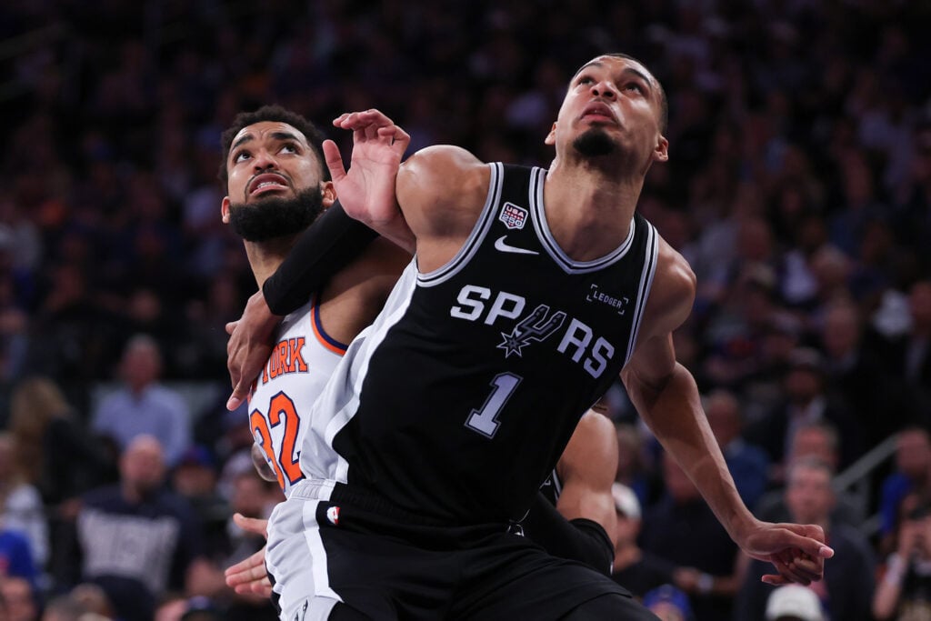Victor Wembanyama #1 of the San Antonio Spurs and Karl-Anthony Towns #32 of the New York Knicks battle for position during the fourth quarter in Game Three of the 2026 NBA Finals at Madison Square Garden on June 08, 2026 in New York City.