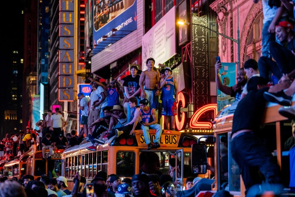 New York Knicks celebrate after they win the NBA Finals in Times Square on June 14, 2026 in New York City. The New York Knicks lead the San Antonio Spurs 3-1 and could win the franchise's first NBA championship since 1973 if they win tonight.